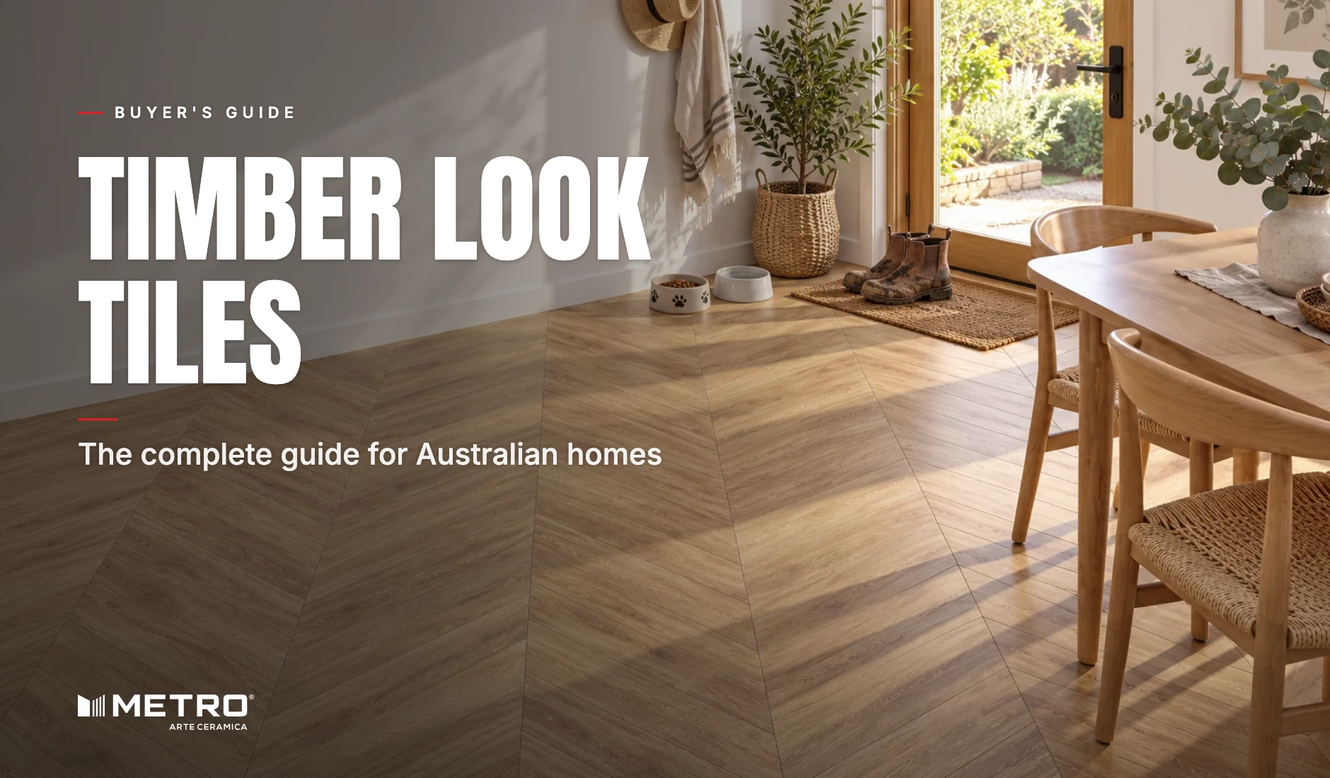 Open-plan living room in an Australian home with wide timber look tiles running from the kitchen through to the alfresco doors